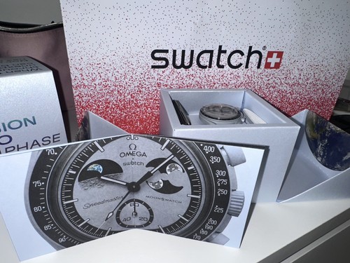 Swatch omega mission - x,